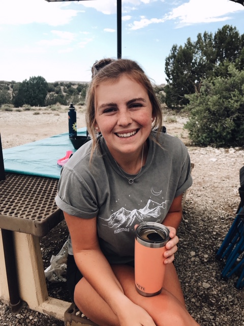 yeti coffee cup and mountain t-shirt